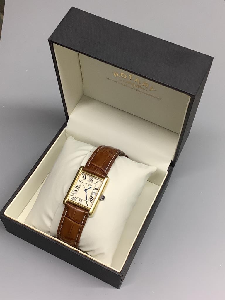 A gentleman’s gilt sterling Rotary quartz wrist watch, on a leather strap with rotary box.